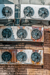 Air conditioning equipment on the wall on a winter day