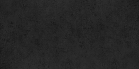 Black old concrete wall widescreen texture. Dark rough shabby cement surface. Abstract grunge banner textured background