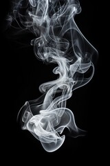 Close-up view of smoke against a black background. Can be used to create a dramatic or mysterious atmosphere in design projects