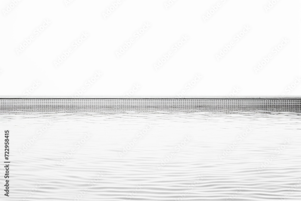Poster a black and white photo of a man standing in the water. suitable for various applications