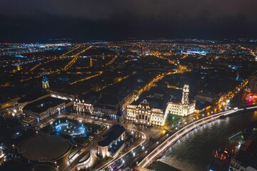 Luminescence: Captivating Aerial View of Oradeas Night Cityscape in Romania