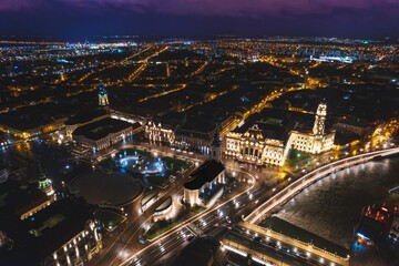 Fototapeta na wymiar Enigmatic Night Whispers: A Mesmerizing Aerial Glimpse of Bihors Luminous Oradea City