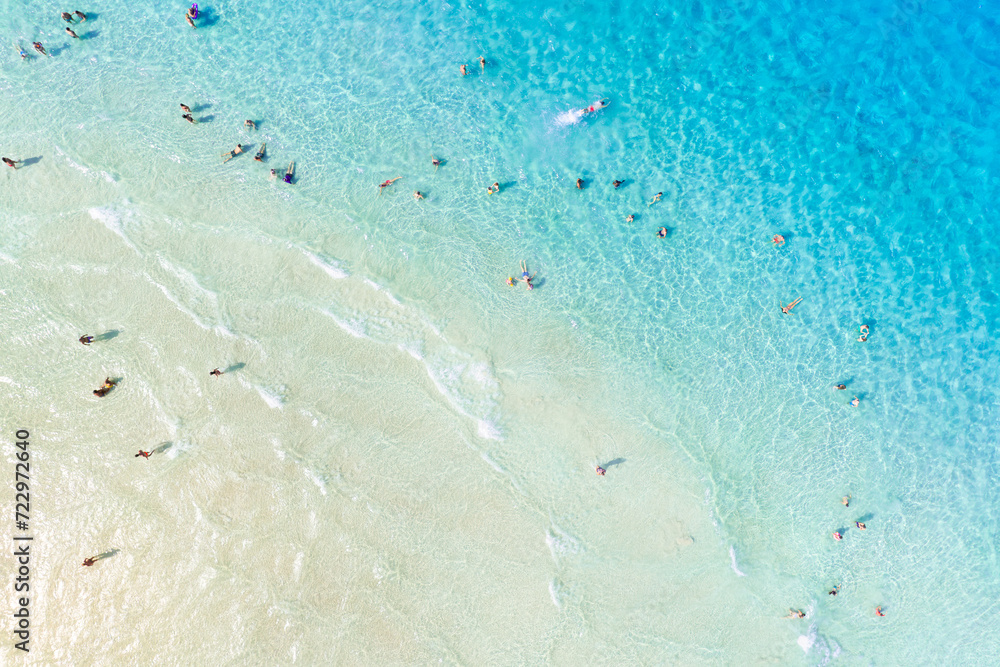 Wall mural aerial view on beach and people. vacation and adventure. europe, mediterranean sea. top view from dr