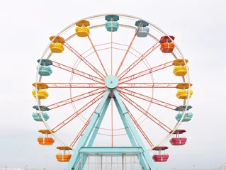 Deurstickers a ferris wheel with many colorful seats © Valentina