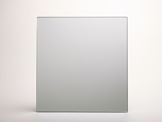 a square mirror on a white background