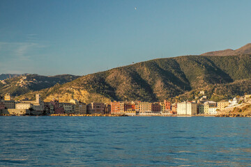 sestri levante silence bay view from the sea at sunset Baia del Silenzio sea harbor and beach view Liguria, Italy.