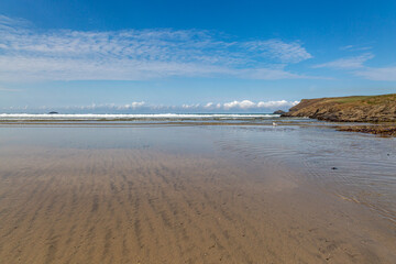 The sandy beach at Polzeath on the North Cornish Coast, on a sunny day