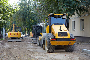 Road digging equipment at a road construction site. Work on repairing the roadway