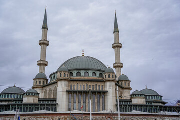 Fototapeta na wymiar Taksim Square Mosque in front of Republic Monument Istanbul Turkey
