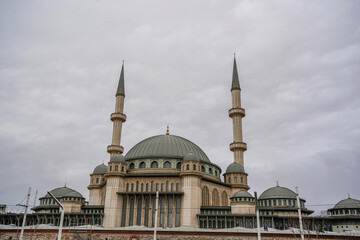 Fototapeta na wymiar Taksim Square Mosque in front of Republic Monument Istanbul Turkey
