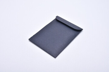 a small black envelope isolated on a white background