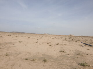 Fototapeta na wymiar A beautiful desert and beautiful big house in this area seen carefully 