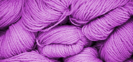 Knitting background and texture in lila and pink, handmade and hobby	