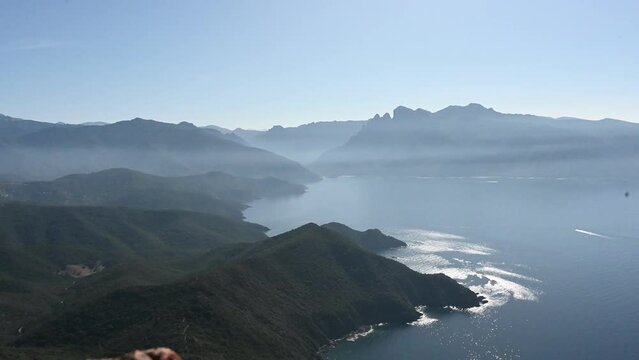 Coast of Corsica on a misty morning from mount Senino