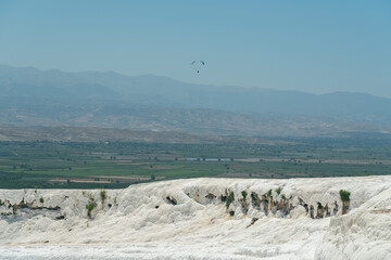 paragliding over the travertines in Pamukkale