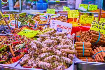 Spice mixes and dried fruits in stall of Atarazanas central market, Malaga, Spain