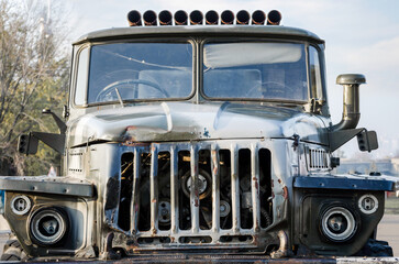 cockpit of an old damaged army military truck