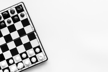 Chessboard with chess pieces, top view. Challenge and leadership concept