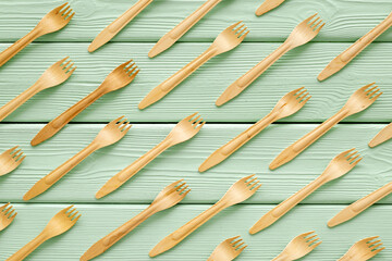 Pattern of wooden eco friendly disposable forks. Zero waste concept