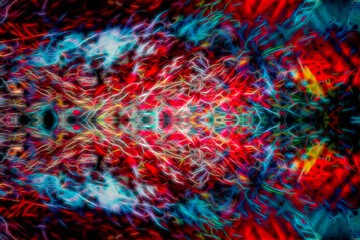 Fototapeta premium An abstract background of mostly red that started as a rainy day through the windshield of our car in Windsor in Upstate NY. Dream like mirrored image with horizon line in the center.
