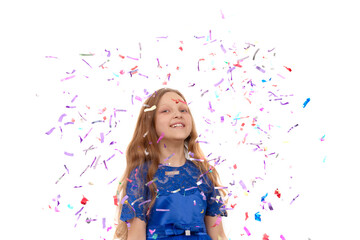 Obraz na płótnie Canvas Little happy girl throwing colorful confetti on a white background.