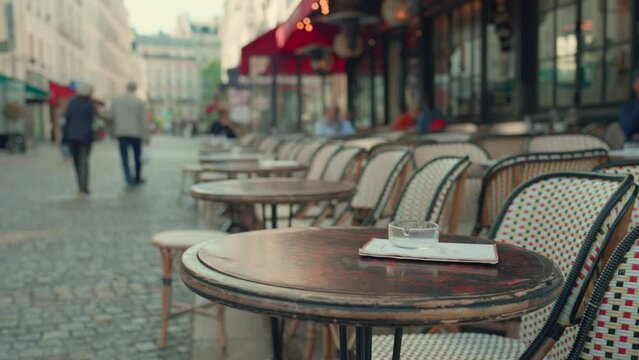 Street cafe with tables on a famous street in Paris