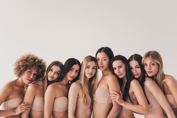 No filter photo of stunning feminist friends support body positivity attitude isolated pastel color...
