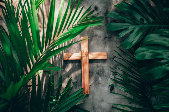 overhead view of a religious cross with palm leaves. Easter palm sunday background