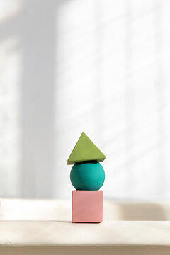 Stack of toy blocks standing on bathtub rim