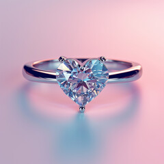 heart shaped diamond engagement ring isolated on plain light pink studio background