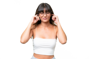 Young caucasian woman over isolated background frustrated and covering ears