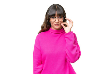 Young caucasian woman over isolated background showing a sign of silence gesture