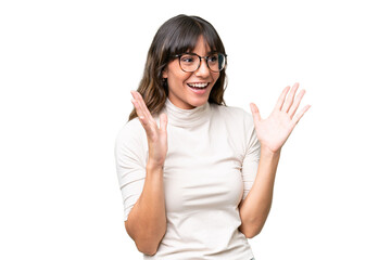 Young caucasian woman over isolated background with surprise facial expression