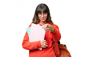 Young student caucasian woman over isolated background surprised and pointing front