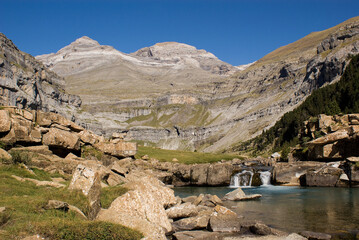 Ara river waterfalls in the Soaso circus in the Ordesa Valley National Park in Aragon Pyrenees with...