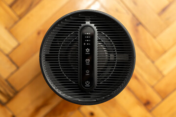 Air purifier health technology in cozy modern living room and cleaning removing dust PM2.5, Air purifier for fresh air and healthy life, Health care Air Pollution Concept. clean dust and fresh home