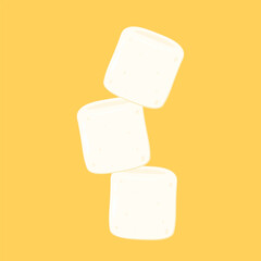 White marshmallows isolated on yellow background.