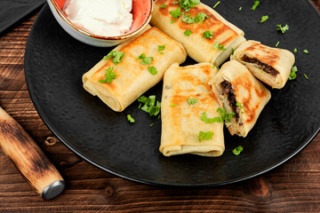 Pancakes stuffed with chicken liver.
