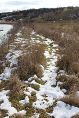 A river with snow on the banks