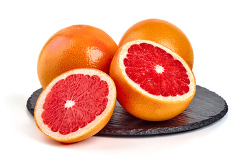 Red grapefruits, isolated on white background.