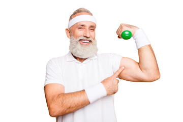 Check this out! Cheerful excited modern cool pensioner grandpa practising bodybuilding, exercising holding equipment up, lifts it with strength and power. Body care, hobby, weight loss lifestyle