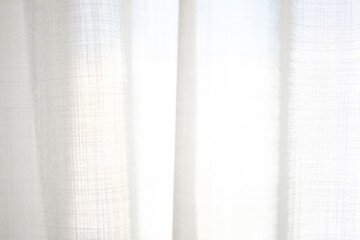 White transparent curtain with sunlight close up