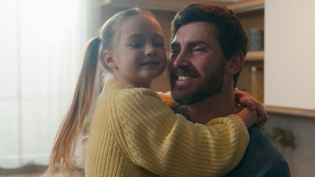 Loving 10s daughter spend weekend with caring daddy custody love people at home kitchen touch noses fooling enjoy priceless carefree time together father with kid child girl hugging happy family bond