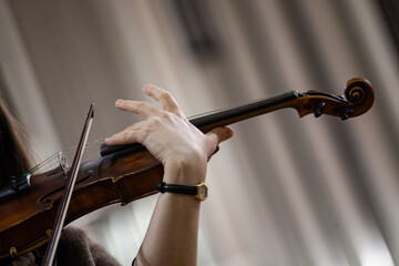 Hand of a woman playing the violin - 723120651