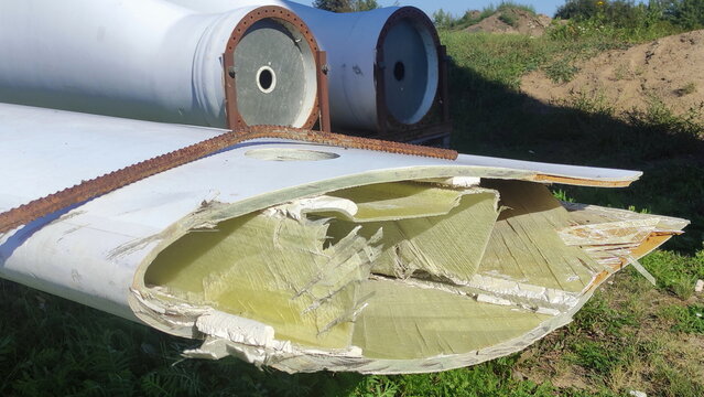 Destruction of the wind turbine blade of a wind farm. Damage to a wind power plant after a strong hurricane collision.