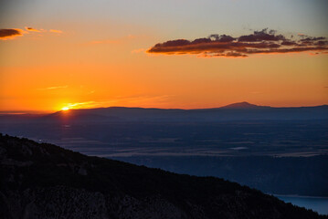 Beautiful sunset with orange sky over France.