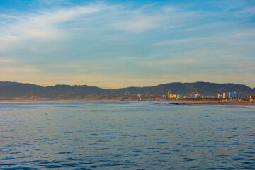 Santa Monica beach with the santa Monica mountains in the background. Picture took in the picture from the venice fishing pier.
