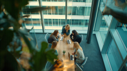 réunion de femme d'affaires dans un bureau moderne d'une tour d'entreprise, vue zénithale, haut plafond  - obrazy, fototapety, plakaty