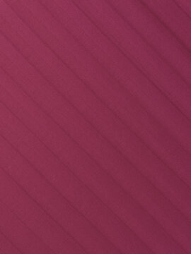 A FRAGMENT OF COTTON FABRIC. STRIPE SATIN. BRIGHT LINGONBERRY