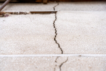 common problem in the walls of many buildings, huge big crack between walls, close of view of a crack, wall crack.